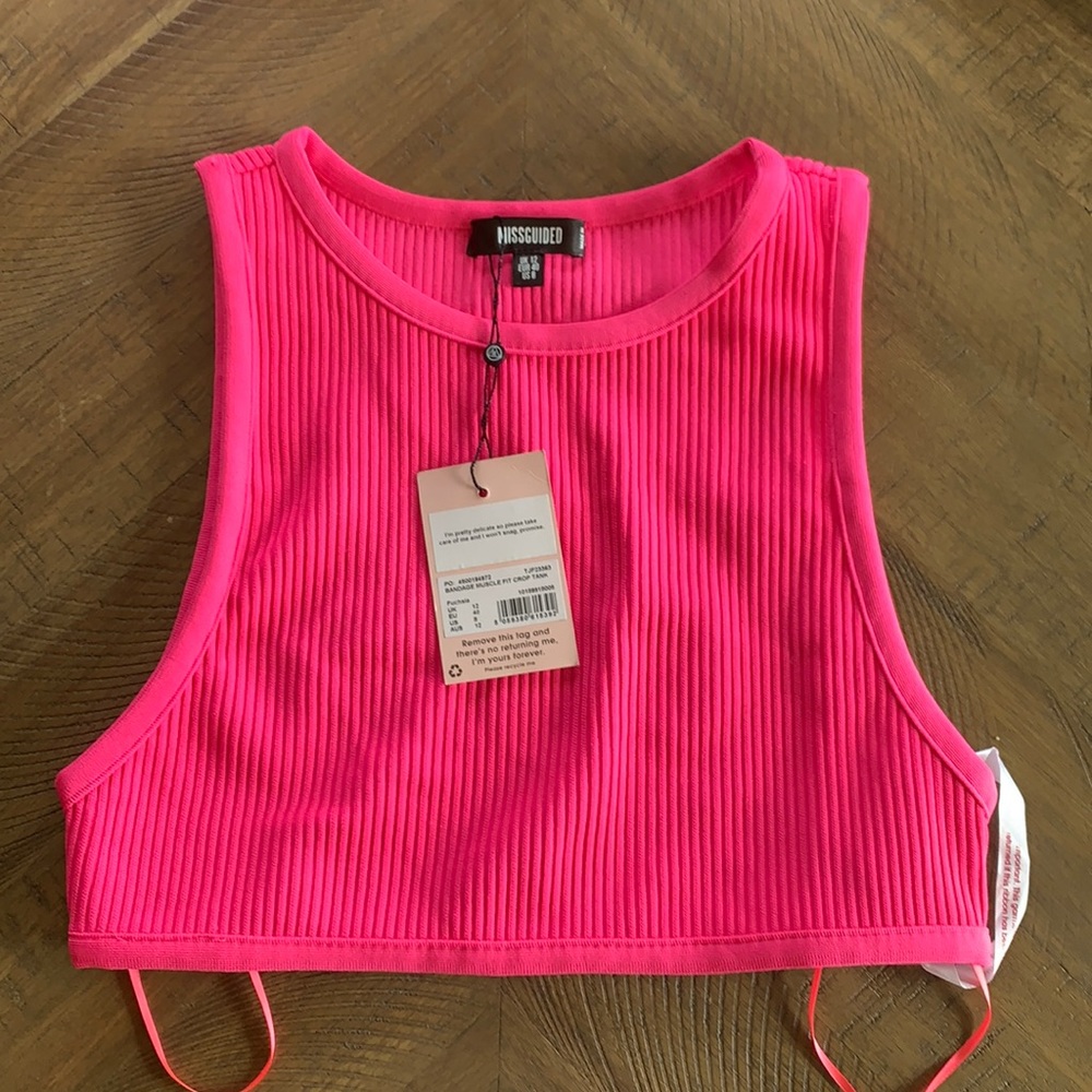 MISSGUIDED hot pink crop top.